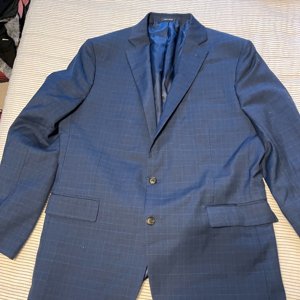 Men’s blue suit jacket